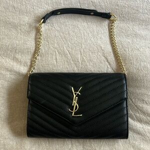 Designer handbag black gold hardware